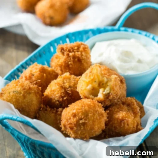 Crispy Fried Mashed Potato Balls with ranch dip, perfect for Thanksgiving leftovers.