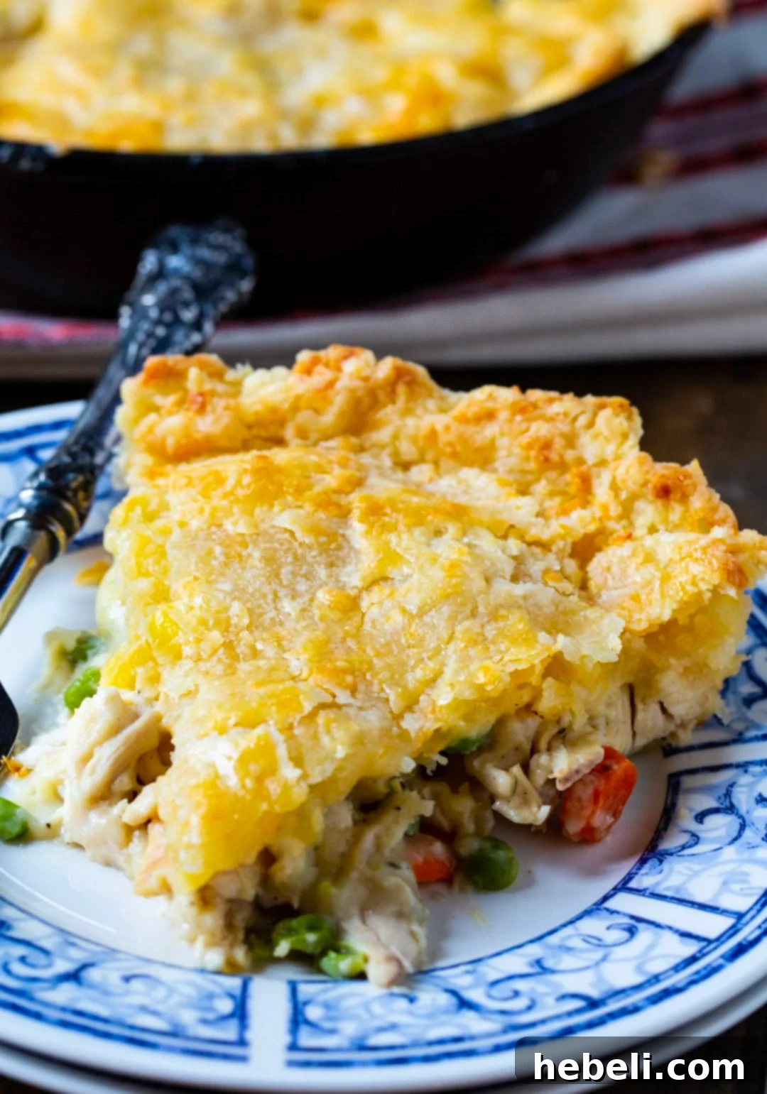 Cheddar Crusted Skillet Chicken Pot Pie 4 Slice of Skillet Pot Pie on a plate, showcasing the cheddar crust.
