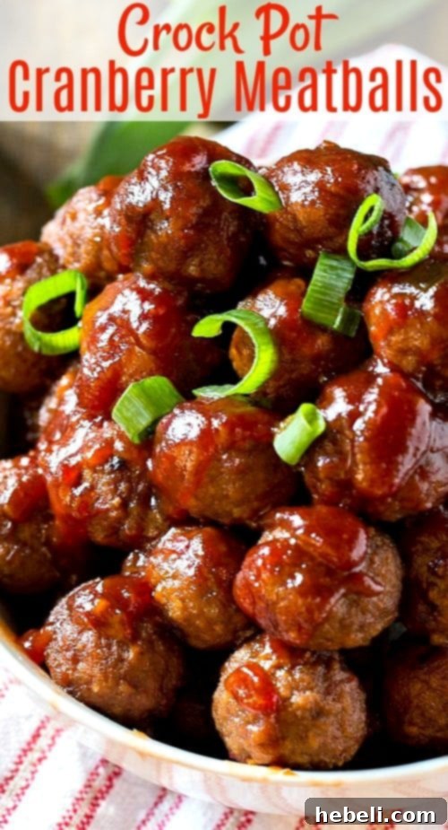 A stunning overhead shot of Crock Pot Cranberry Meatballs, perfectly glazed and inviting.