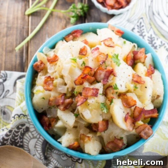 Hot Potato Salad, a delightful blend of sweet, sour, and salty, prepared with no added sugar for a healthier twist using SPLENDA®. An ideal savory side. #SplendaSweeties #SweetSwaps #savory