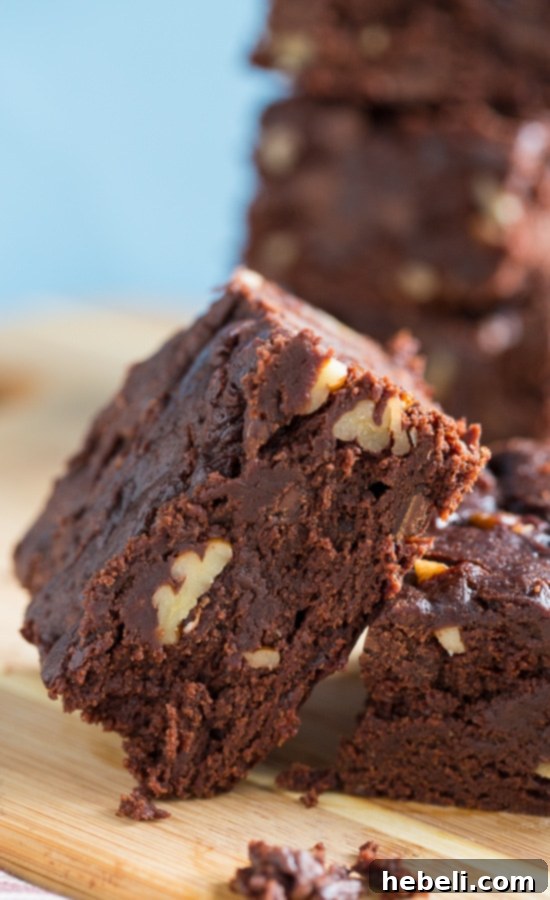 Slow Cooker Triple Chocolate Brownies cooling on a rack