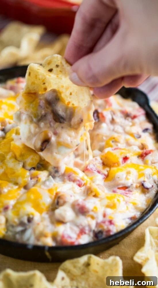 Fiery Black-Eyed Pea Delight 9 Chase smiling brightly, a symbol of hope and recovery, inspiring others with his journey.