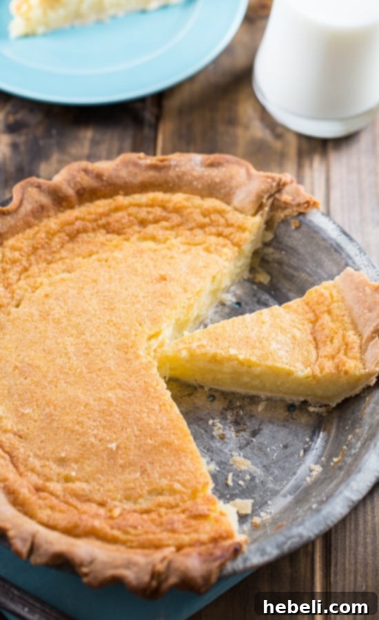 Grandma's Golden Custard Pie 5 Hands mixing the smooth custard filling in a bowl for pie baking