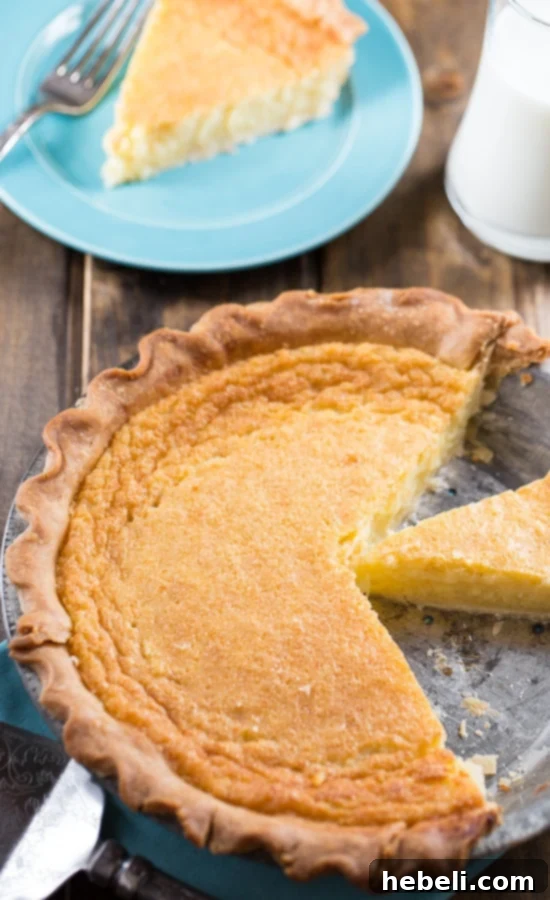 Grandma's Golden Custard Pie 6 A freshly baked Old-Fashioned Egg Custard Pie cooling on a wire rack