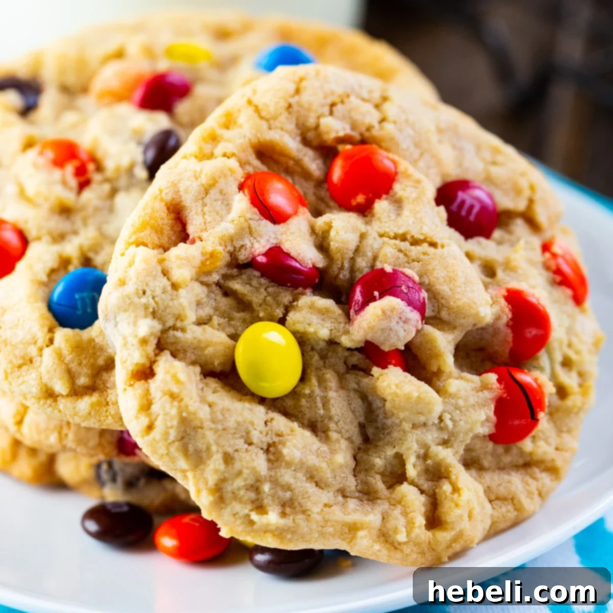 Perfect Soft & Chewy M&M Cookies 2 Soft and Chewy M&M Cookies on a plate, displaying vibrant colors and perfect texture, ready to be enjoyed.