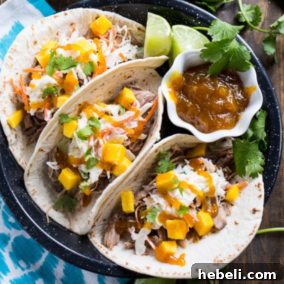 Caribbean Pork Tacos 7 Side view of a fully loaded Caribbean Pork Taco