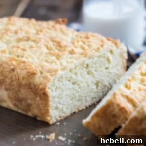 Homemade Buttermilk Bread in a loaf pan, fresh out of the oven