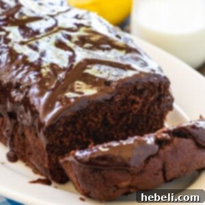 Decadent Triple Chocolate Banana Loaf 6 Chocolate Banana Bread on a white serving platter