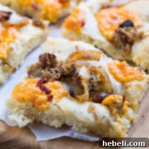 Southern-Style Focaccia with pulled pork, pimento cheese, and vidalia onions.