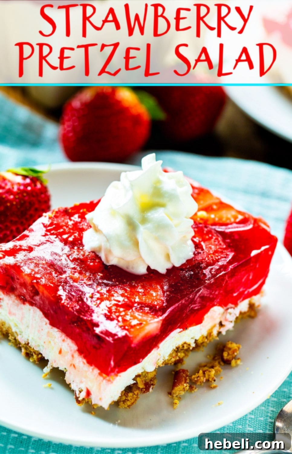 Top-down view of a full 9x13 inch pan of Strawberry Pretzel Salad, perfectly set with distinct layers, ready to be cut into servings.