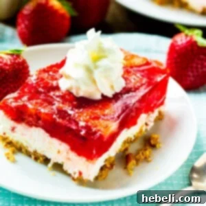 Slice of Strawberry Pretzel Salad on a plate.