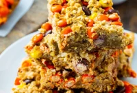 Chewy Reeses Pieces Peanut Butter Oatmeal Bars