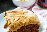 Decadent Coca-Cola Cake with Broiled Peanut Frosting