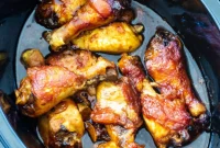 Sweet and Savory Slow Cooker Garlic Peach Chicken Legs