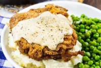 Golden-Fried Pork Chops Smothered in Country Gravy