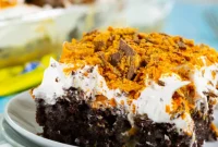 Ultimate Butterfinger Poke Cake