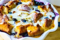 Heavenly Blueberry White Chocolate Bread Pudding with Velvety Amaretto Cream
