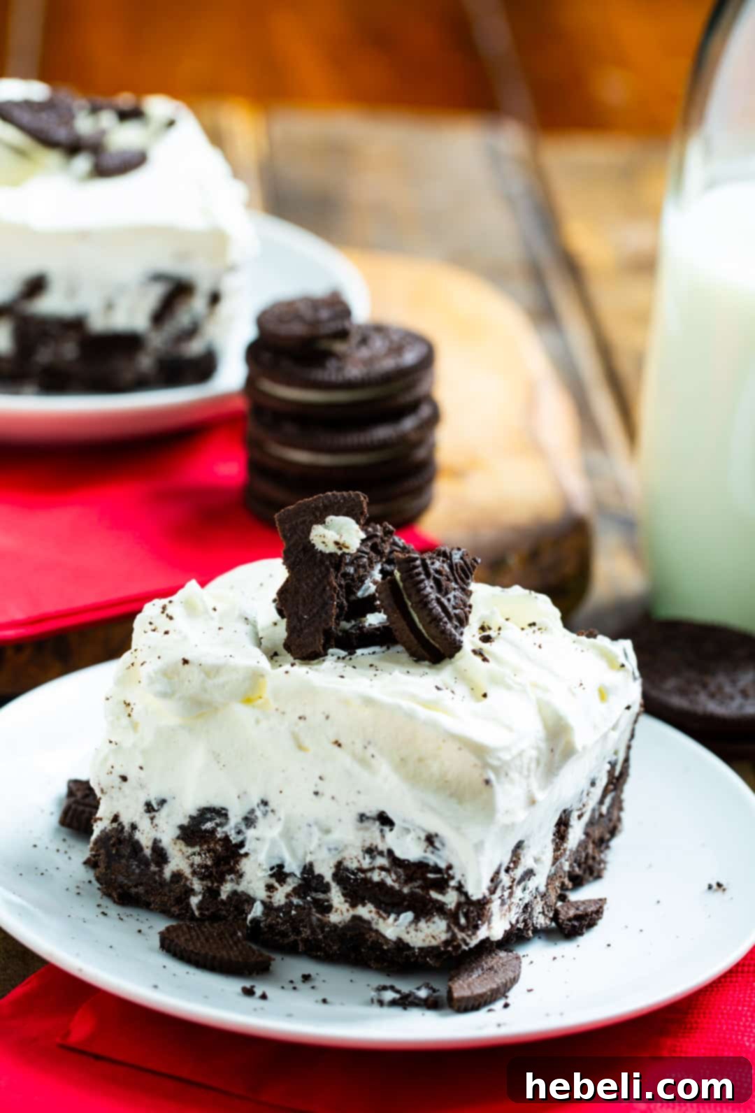 Multiple Cookies and Cream Ice Cream Bars served on small individual plates.