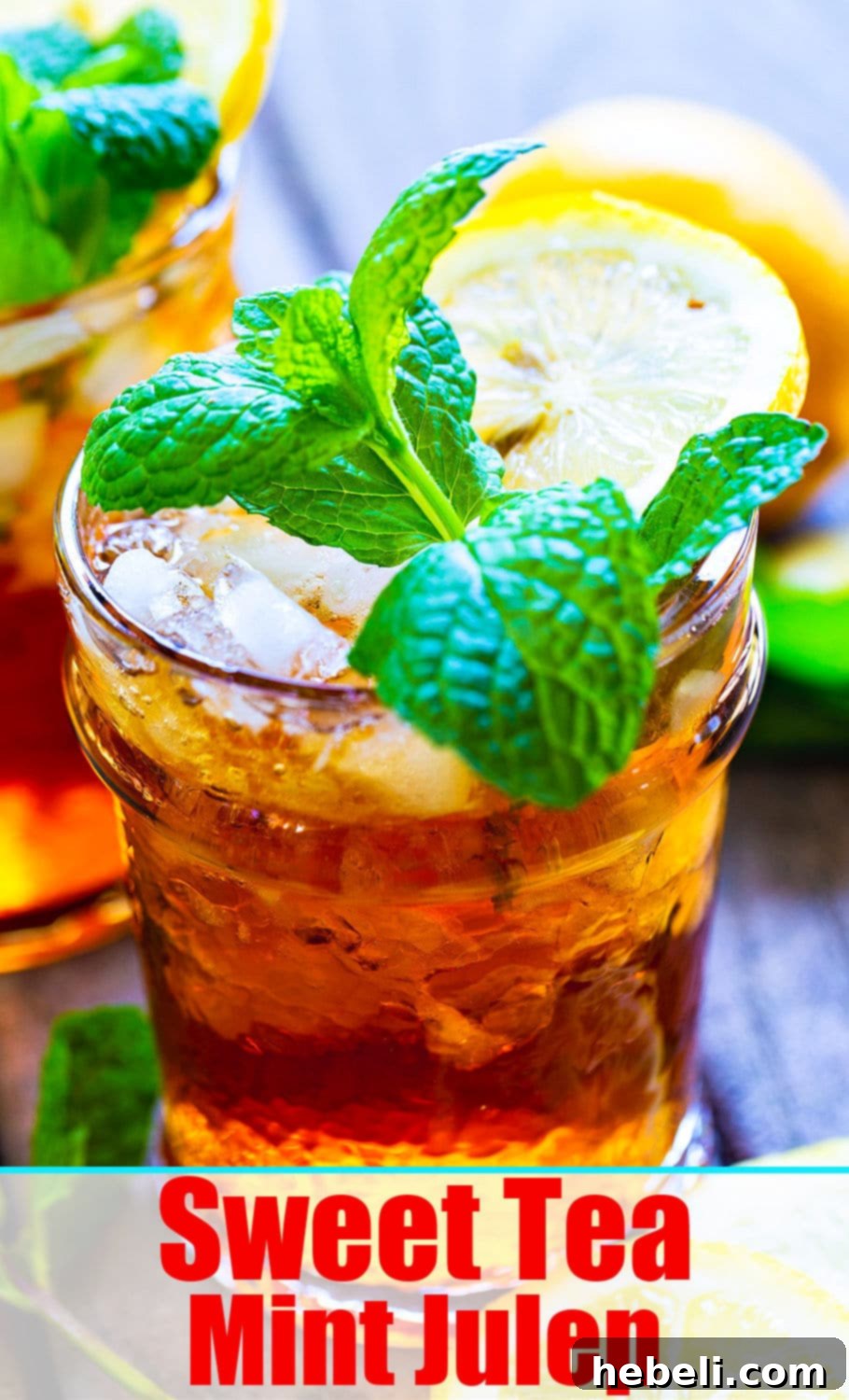 A vibrant Sweet Tea Mint Julep garnished with mint and lemon, highlighting its refreshing appeal.