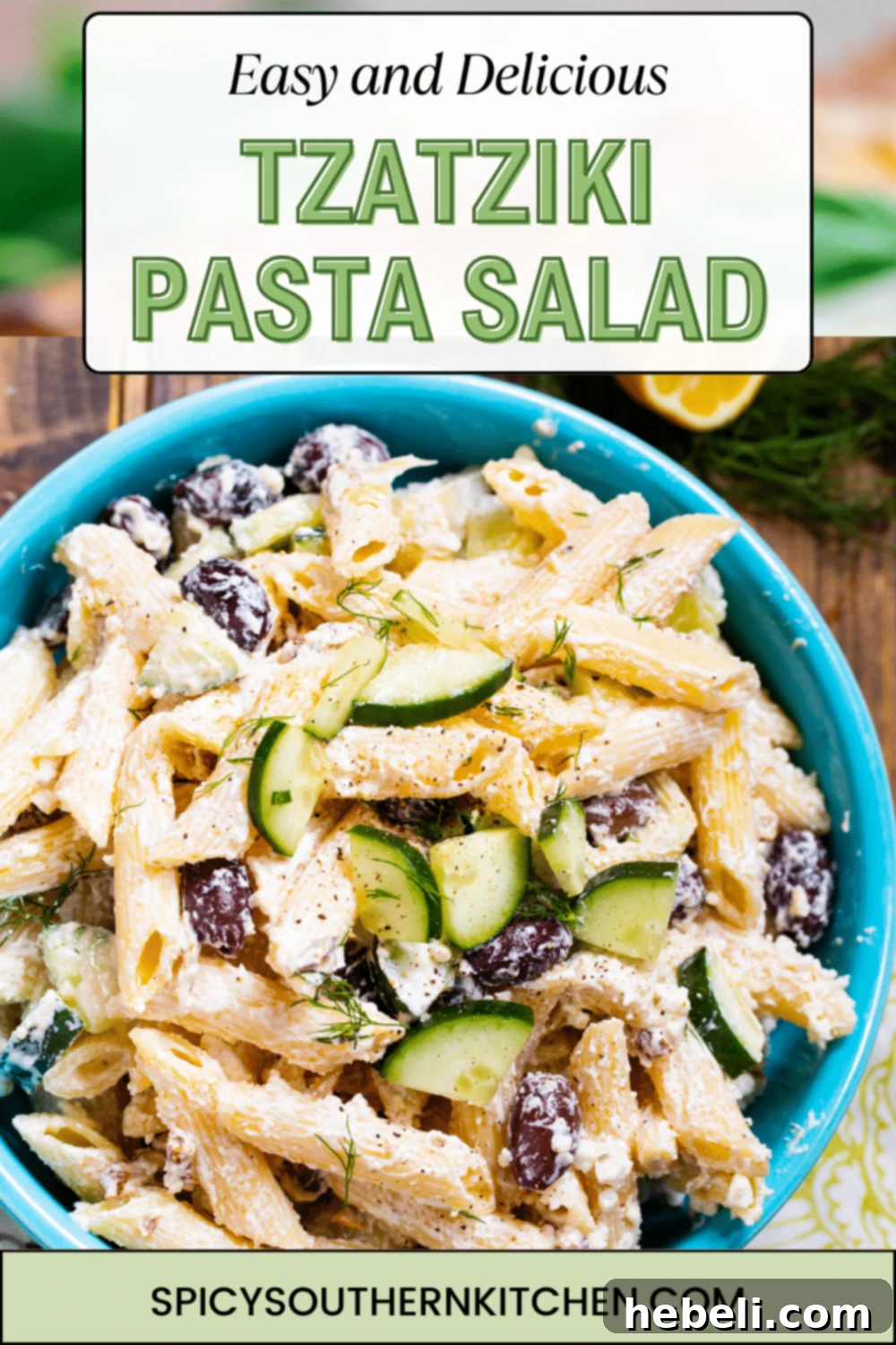 Serving bowl of Tzatziki Pasta Salad on a table, ready to be enjoyed.