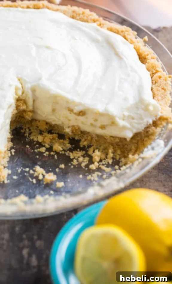 Homemade shortbread crust for Lemon Icebox Pie, pressed into a pie plate and ready to chill