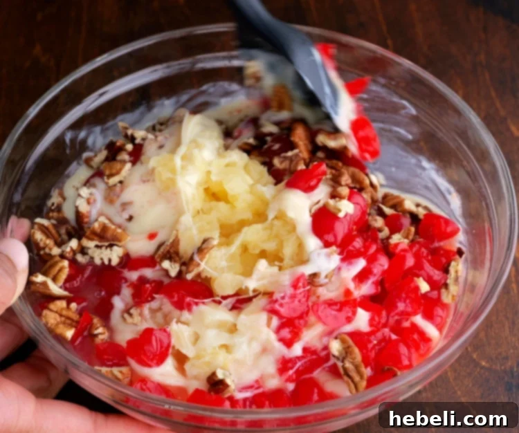 Ultimate No Fuss Millionaire Pie 5 All the delicious filling ingredients being mixed together in a bowl.