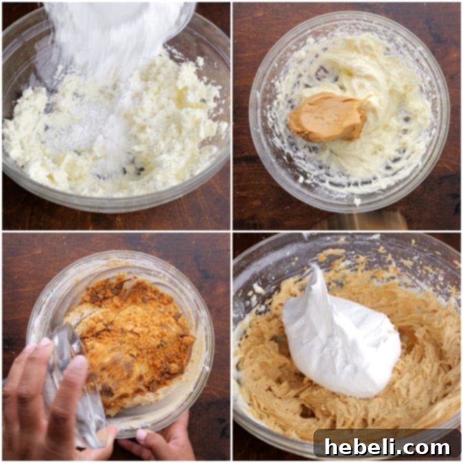 A bowl of creamy peanut butter and cream cheese mixture being thoroughly mixed with a hand-held electric mixer for the second layer of the dessert.