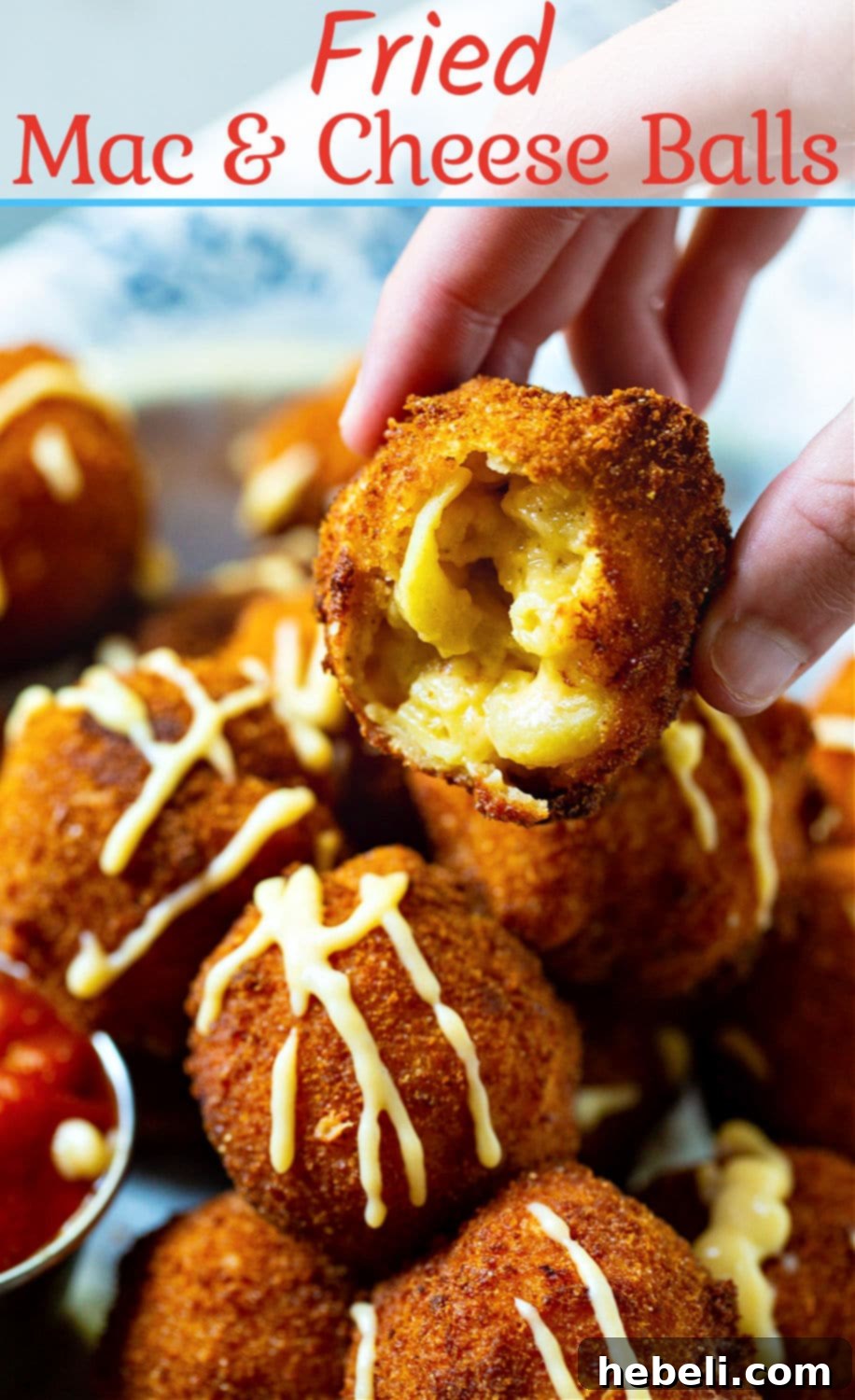 Three perfectly golden fried mac and cheese balls served with a drizzle of cheese sauce, resembling TGI Friday's appetizer.