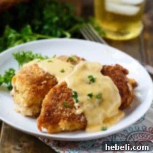 Cheesy Chicken Breasts with a crushed Ritz cracker coating.