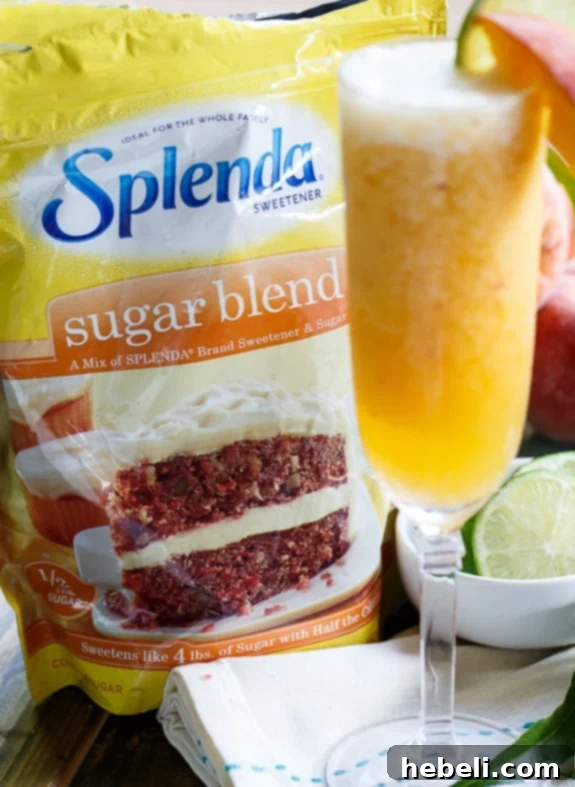 Icy Peach Delight 5 Frozen Peach Bellini Mocktails with #Sweetswaps and #SplendaSweeties hashtags.