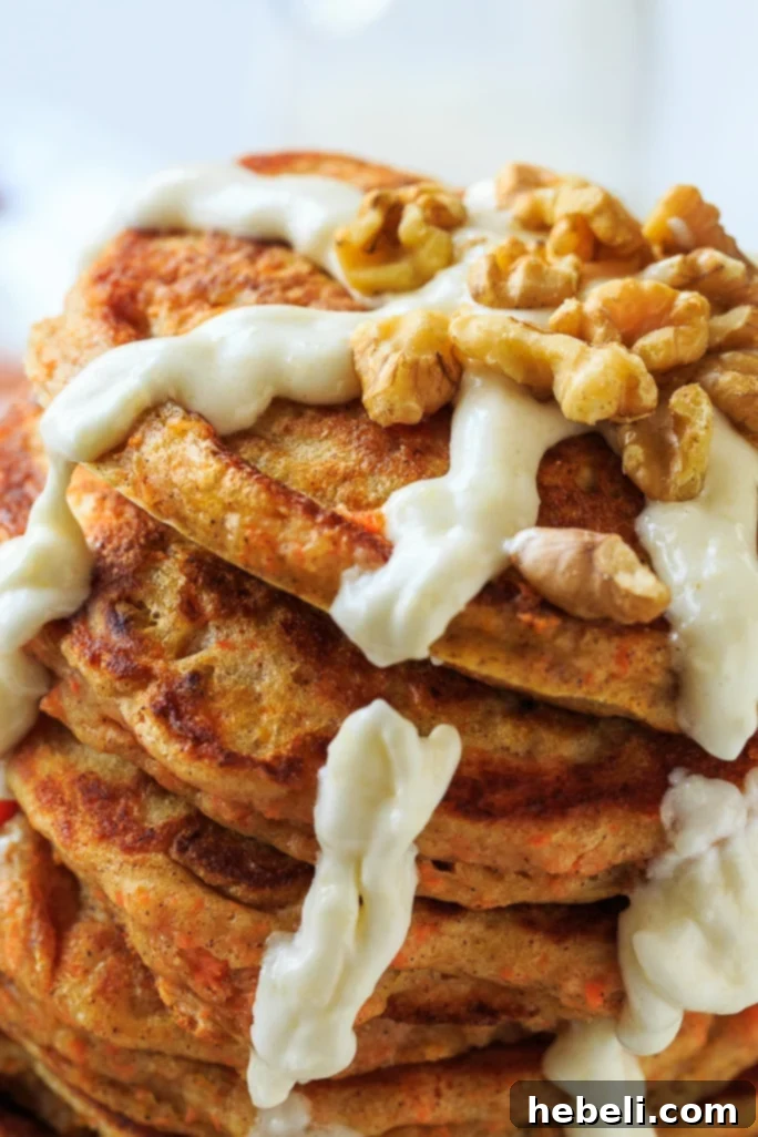 Close-up of a stack of Carrot Cake Pancakes, ready to serve
