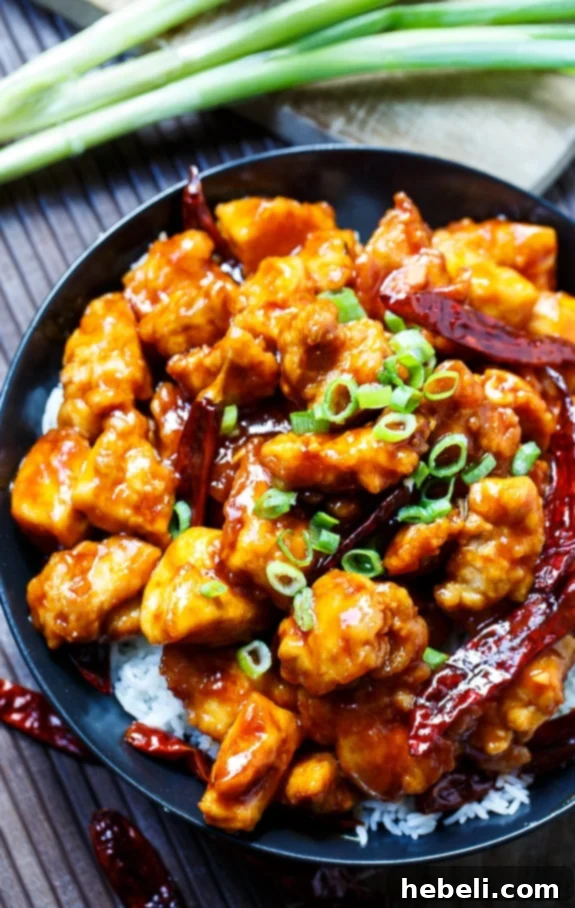 General Tso's Chicken: A Glimpse of the Rich, Spicy Sauce with Aromatics