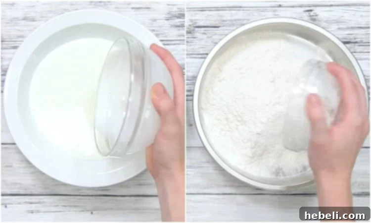 A shallow bowl filled with buttermilk next to a pie plate containing flour, set up for breading pork chops.