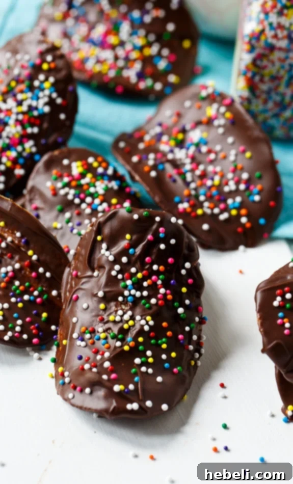 Sweet & Salty Pringle Perfection 3 Close-up of freshly dipped Chocolate Covered Pringles on parchment paper