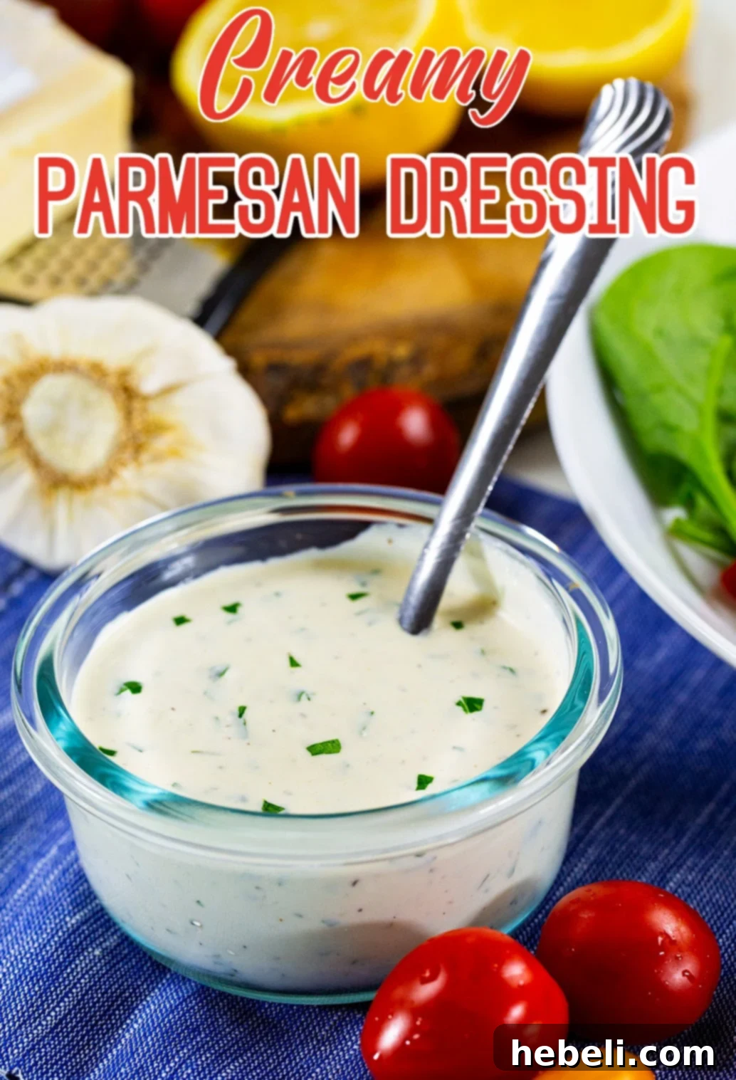 Carrabbas Style Creamy Parmesan Dressing 4 A pristine glass bowl filled with the homemade Creamy Parmesan Dressing, showcasing its smooth consistency and rich color.