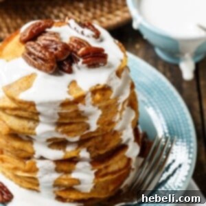Sweet Potato Pancakes with marshmallow sauce and sugared pecans.