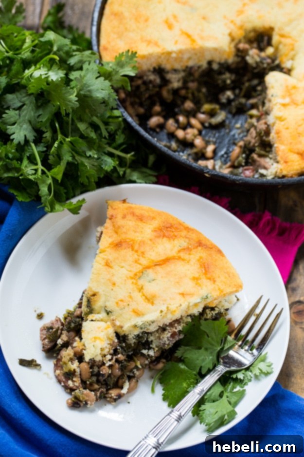 One-pan Festive Good Luck Cornbread Skillet with savory ingredients.
