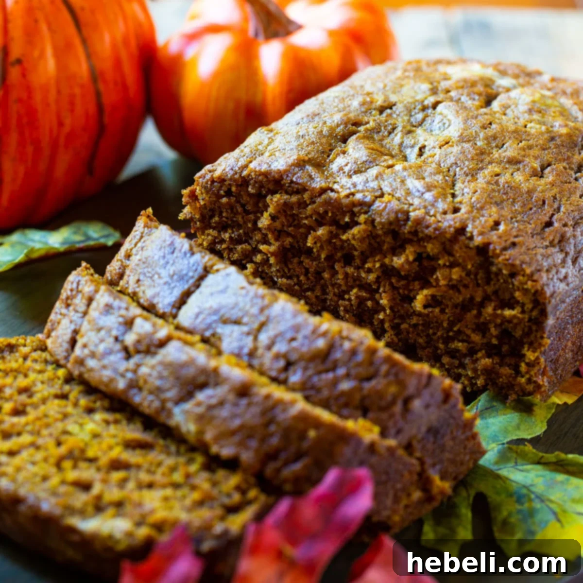 Zesty Pumpkin Loaf 2 Perfectly sliced Spicy Pumpkin Bread, revealing its moist texture and rich color, ready to be enjoyed.