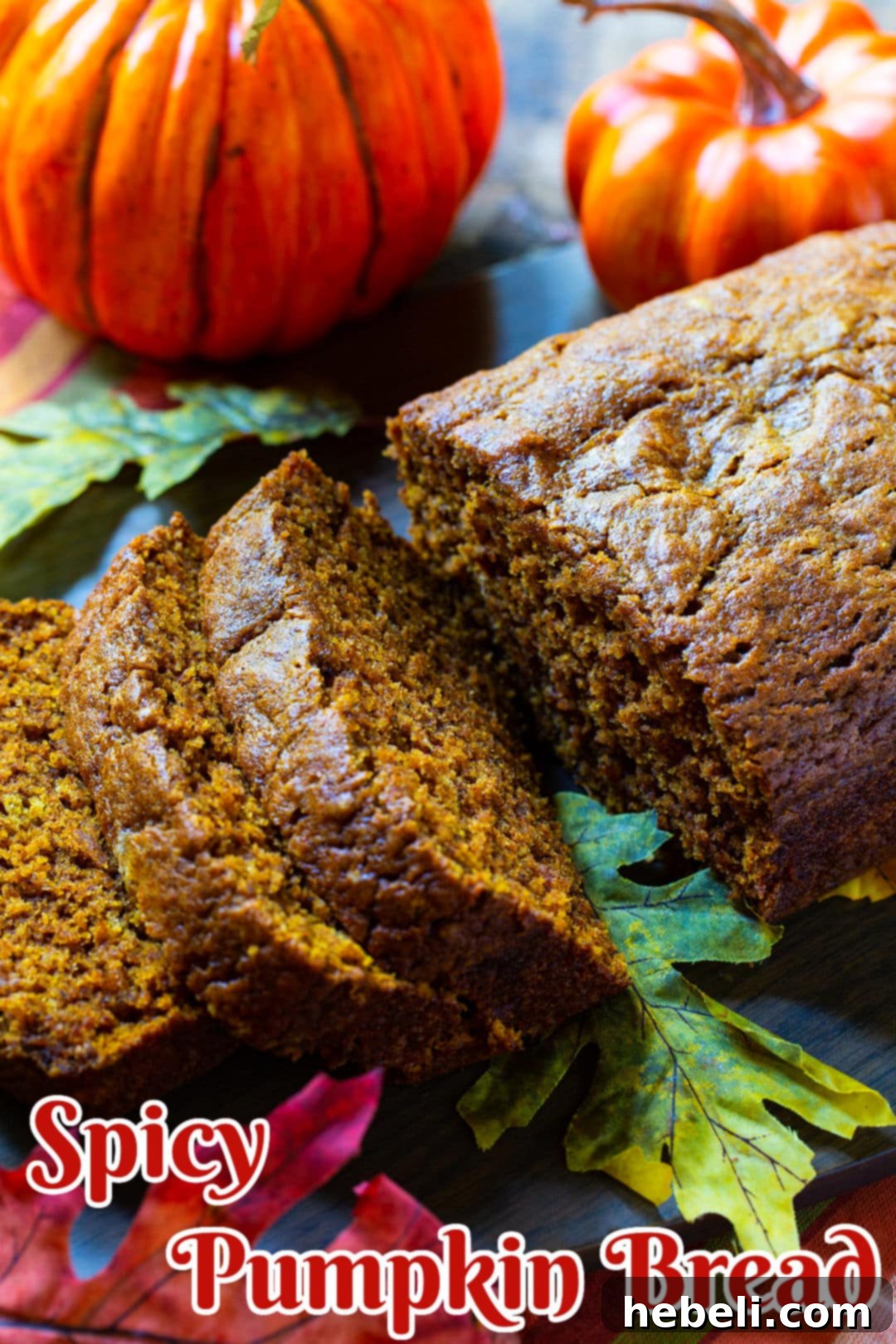 Zesty Pumpkin Loaf 5 Close-up of a slice of Spicy Pumpkin Bread, highlighting its soft crumb and specks of spice.