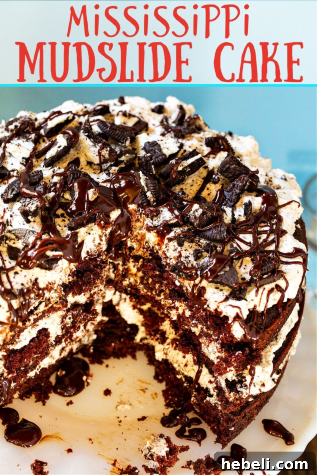 A stunning close-up of the Mississippi Mudslide Cake, highlighting its rich chocolate texture, creamy Kahlua whipped cream, and scattered Oreo crumbles.