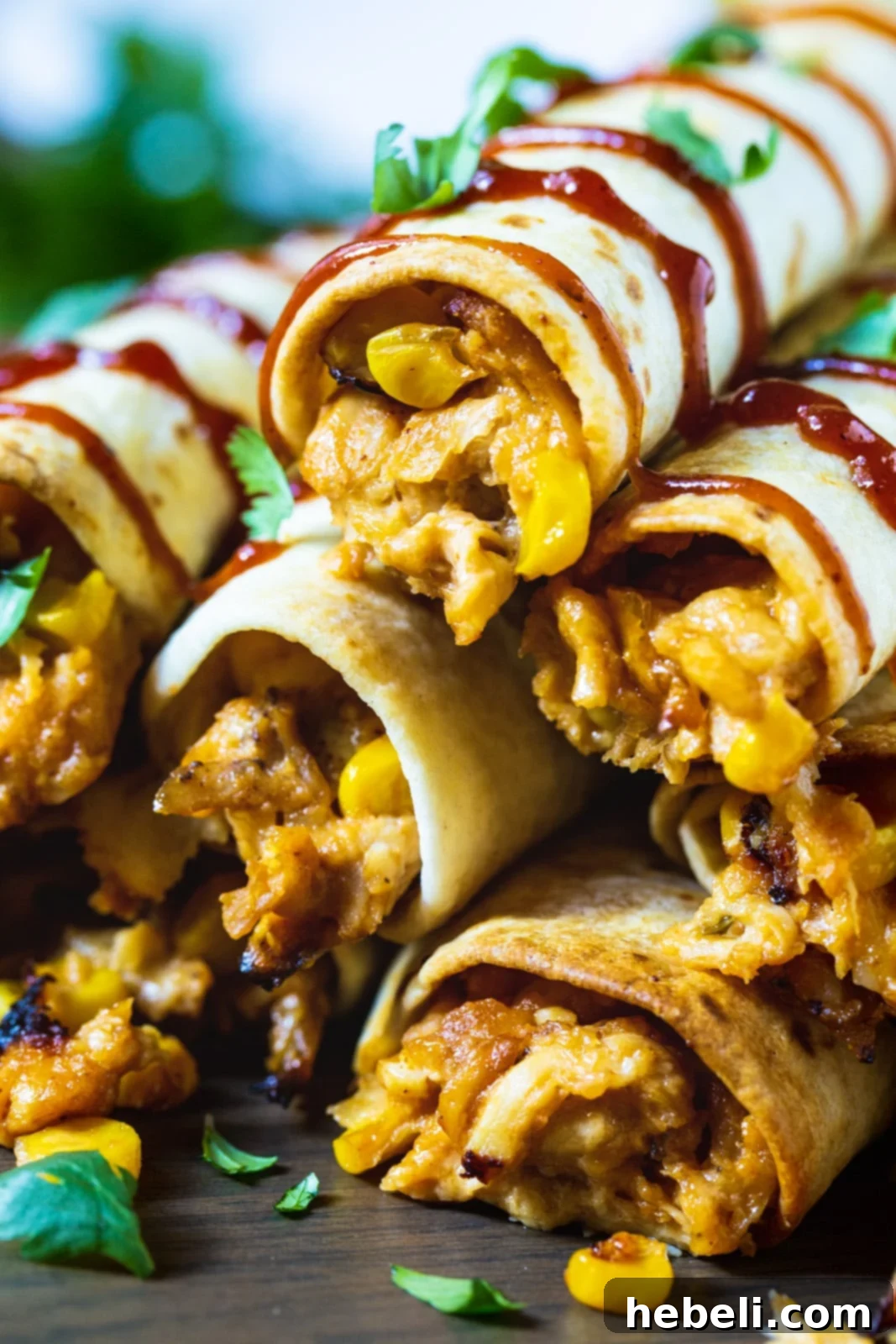 Crispy BBQ Chicken Bites 4 Close-up view of crispy BBQ Chicken Taquitos, showing the golden-brown tortilla and a hint of the flavorful filling.