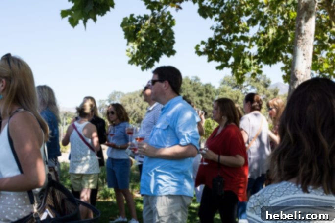 Group of attendees enjoying the Fess Parker Winery excursion with Ruby Princess Cruise, featuring wine tasting and beautiful scenery