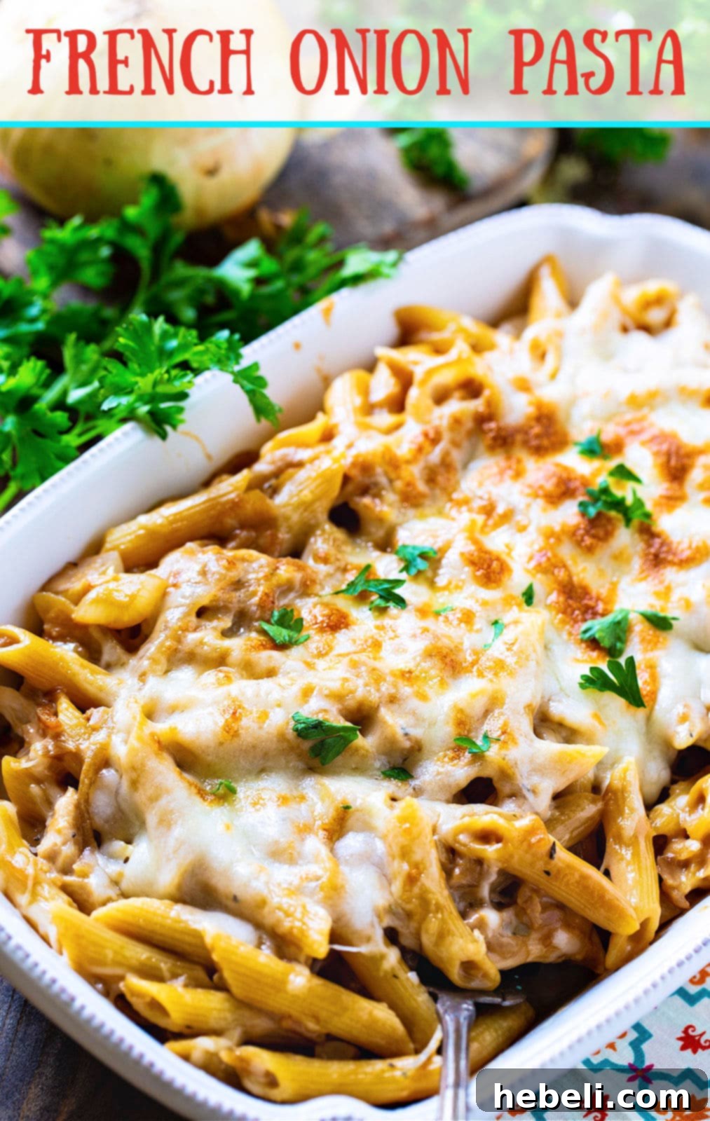 A close-up shot of French Onion Pasta, highlighting the rich sauce and melted cheese, ready to be served.