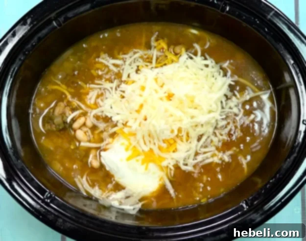 Shredded cheese added.