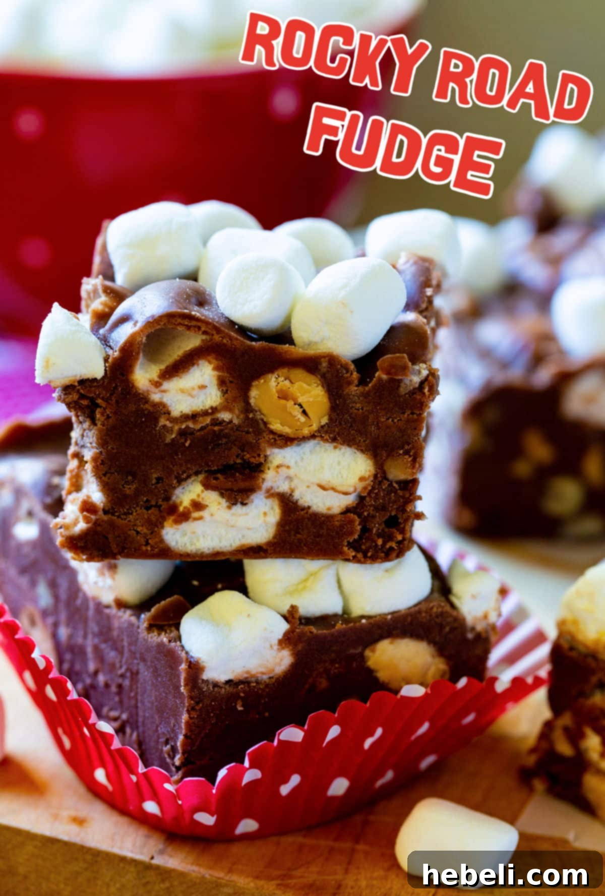 Stacked pieces of rich Rocky Road Fudge, ready to be enjoyed or shared.