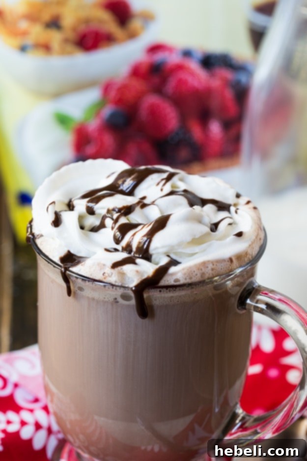 Decadent Mocha Delight 4 Ingredients for Mocha Hot Chocolate laid out on a wooden surface