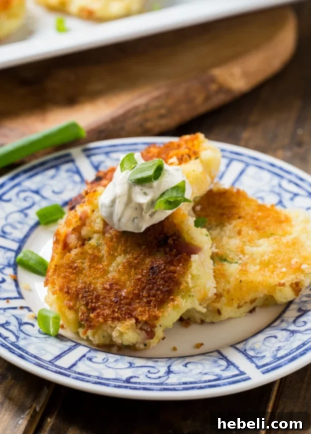 Stacked Mashed Potato Croquettes with ham and ranch seasoning, an appealing leftover solution
