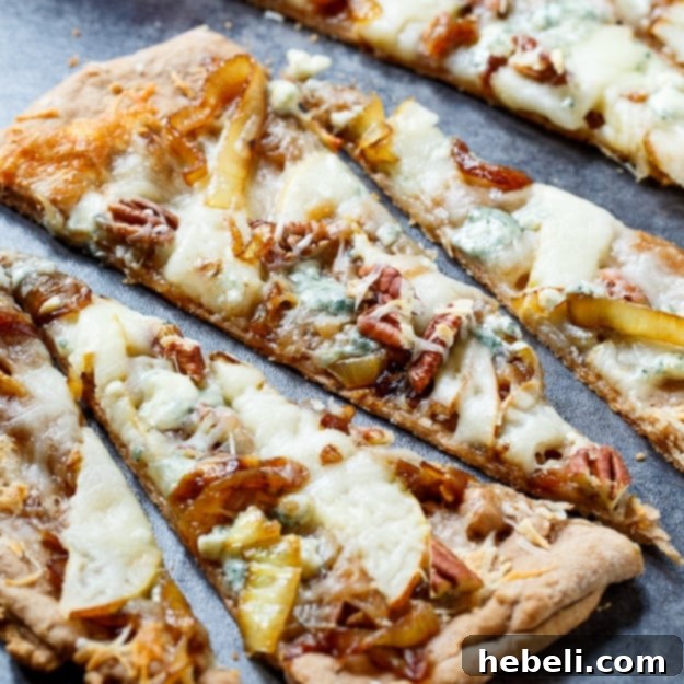Golden Caramelized Onion and Melted Cheese Flatbreads 2 Cheesy Caramelized Onion Flatbreads with pears, blue cheese, and pecans.