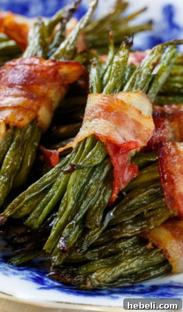 Platter of Green Bean Bundles Wrapped in Bacon, a festive centerpiece.