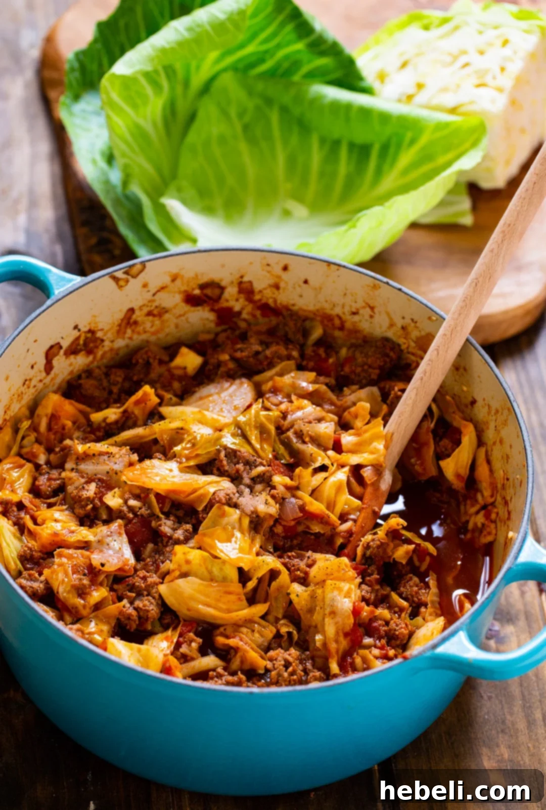 Unstuffed Cabbage Rolls cooked in a vibrant Dutch oven, showcasing the mix of meat, cabbage, and rice.